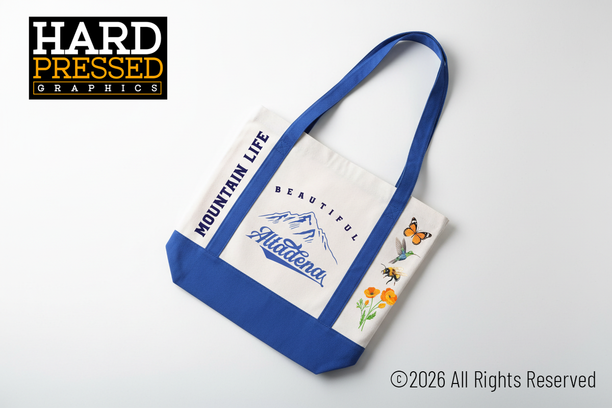Cream mountain life tote bag with blue straps and nature design
