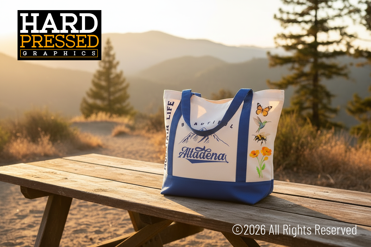 Cream mountain life tote bag with blue straps and nature designs